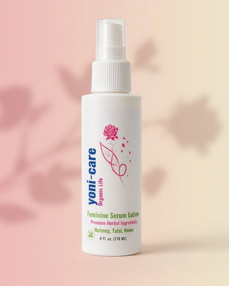 Yoni-care Feminine Serum Lotion bottle on a soft pink studio backdrop